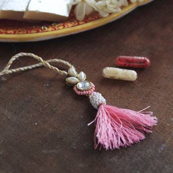 Blush kundan lumba with roli chawal 1
