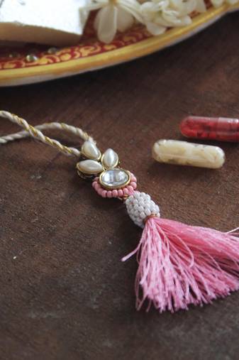 Blush kundan lumba with roli chawal