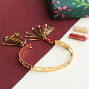 To the moon and back golden glass tubes  lumba band with roli chawal 1