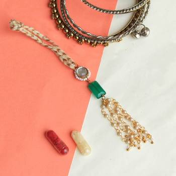 Green stone & pearl tassle lumba  with roli chawal 1