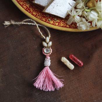 Blush kundan lumba with roli chawal 2