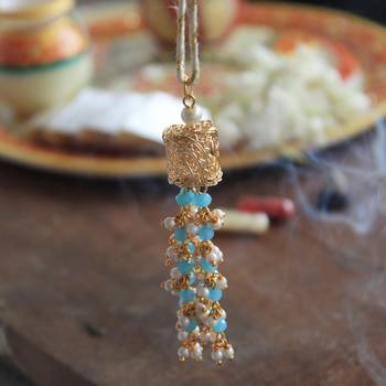 Beads tassel rakhi with roli chawal 3