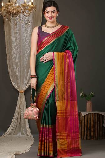 Dark green border silk blend saree with contrast  blouse