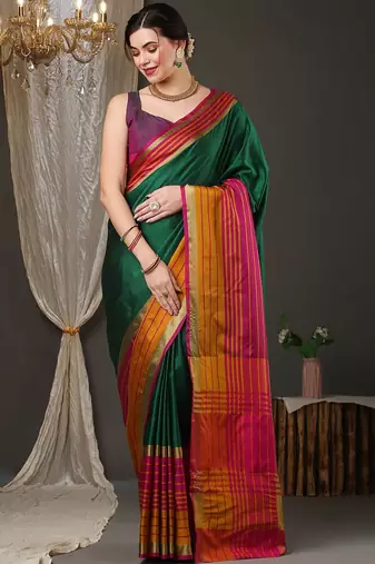 Dark green border silk blend saree with contrast  blouse
