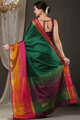 Dark green border silk blend saree with contrast  blouse