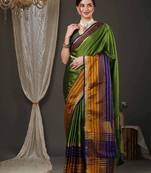 Green border silk blend saree with contrast  blouse