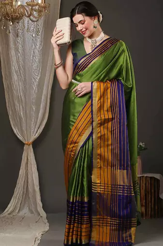 Green border silk blend saree with contrast  blouse