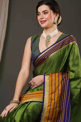 Green border silk blend saree with contrast  blouse
