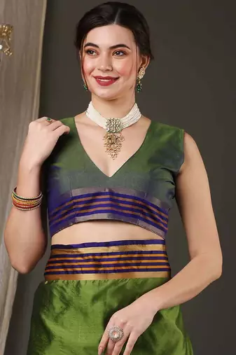 Green border silk blend saree with contrast  blouse