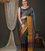 Grey border silk blend saree with contrast  blouse