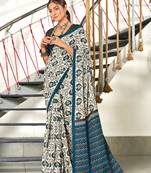 Teal mulmul cotton hand block printed saree with printed blouse piece