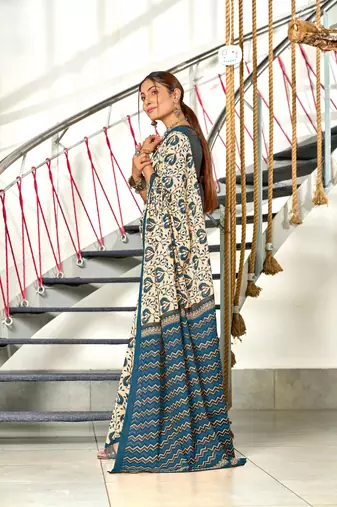 Teal mulmul cotton hand block printed saree with printed blouse piece