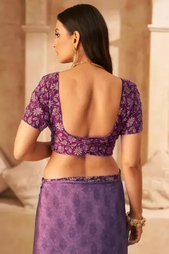 Purple printed crepe silk saree with unstitched blouse piece