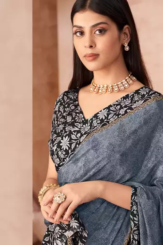 Grey printed crepe silk saree with unstitched blouse piece