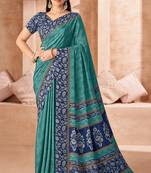 Sea green printed crepe silk saree with unstitched blouse piece