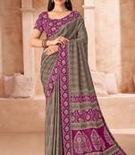 Greyish beige printed crepe silk saree with unstitched blouse piece