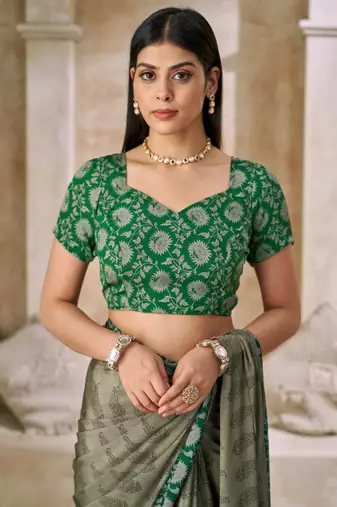 Green printed crepe silk saree with unstitched blouse piece