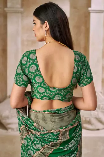 Green printed crepe silk saree with unstitched blouse piece