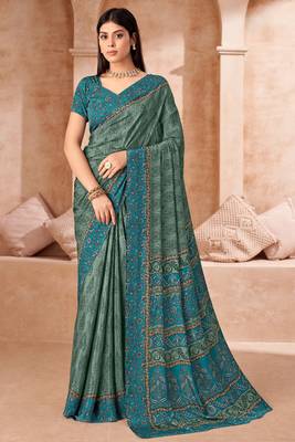 Green printed crepe silk saree with unstitched blouse piece 1