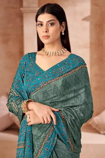 Green printed crepe silk saree with unstitched blouse piece