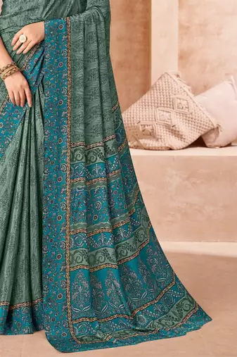 Green printed crepe silk saree with unstitched blouse piece