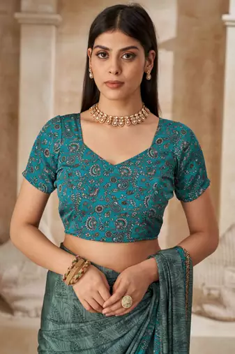 Green printed crepe silk saree with unstitched blouse piece