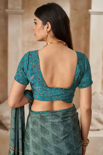 Green printed crepe silk saree with unstitched blouse piece