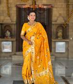 Yellow Banarasi silk blend saree with zari weaving Meenakari design