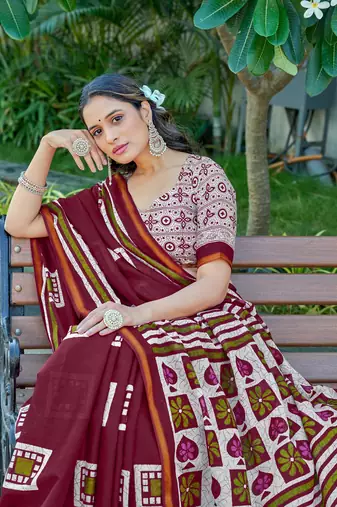 Maroon mulmul cotton printed zari border saree with unstitched blouse piece