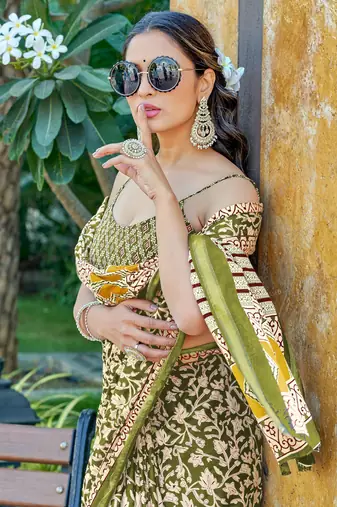 Green mulmul cotton printed zari border saree with unstitched blouse piece