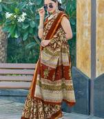 Brown mulmul cotton printed zari border saree with unstitched blouse piece
