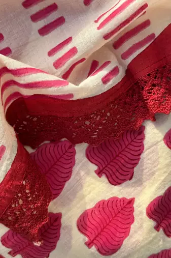 Cream and red hand block leaf printed mul cotton saree with blouse