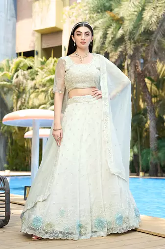 White Embellished Lehenga Choli In Organza