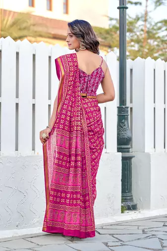 Pink mulmul cotton printed zari border saree with unstitched printed blouse piece