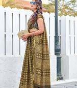 Green mulmul cotton printed zari border saree with unstitched printed blouse piece