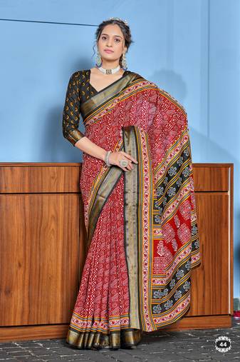 Red cotton ajrakh print saree with contrast blouse piece