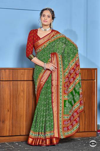 Green cotton ajrakh print saree with contrast blouse piece
