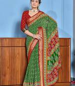 Green cotton ajrakh print saree with contrast blouse piece
