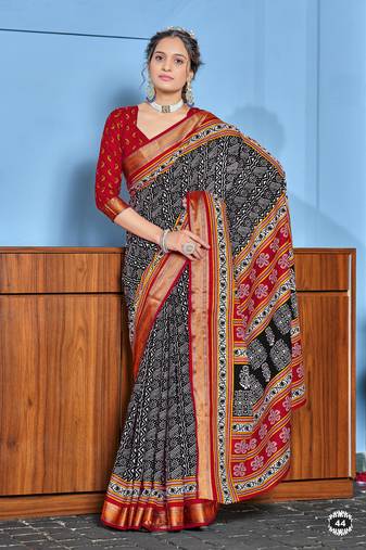 Black cotton ajrakh print saree with contrast blouse piece