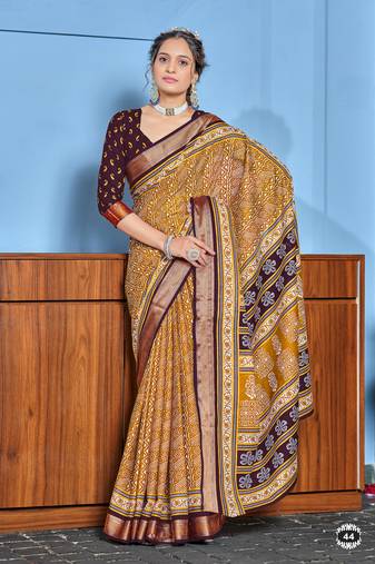 Mustard cotton ajrakh print saree with contrast blouse piece