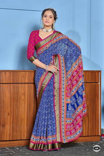 Blue cotton ajrakh print saree with contrast blouse piece