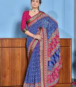 Blue cotton ajrakh print saree with contrast blouse piece
