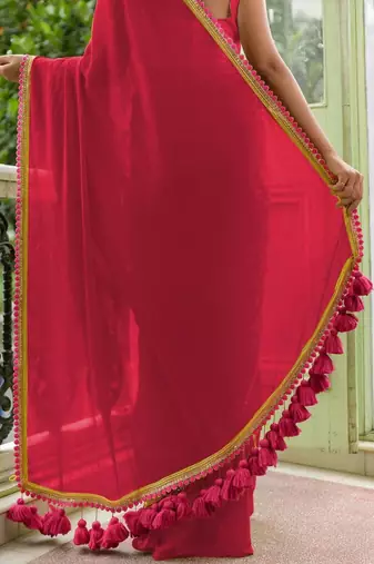 Red soft cotton solid lace work saree with matching blouse piece