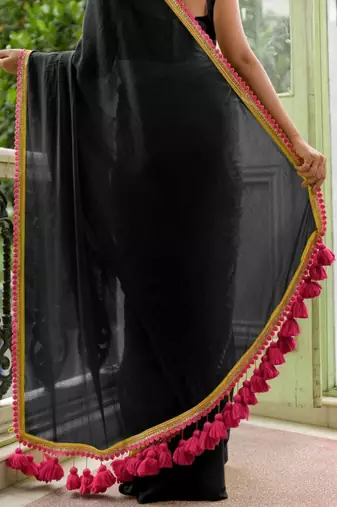 Black soft cotton solid lace work saree with matching blouse piece