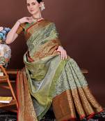 Dark green zari woven silk blend saree
