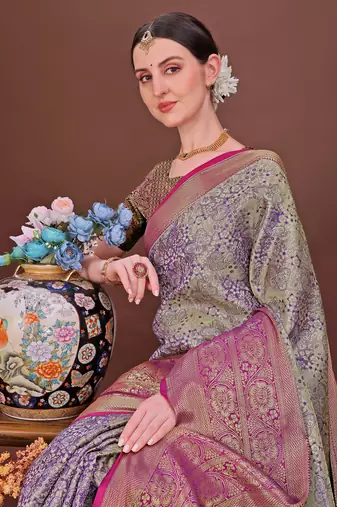 Purple zari woven silk blend saree