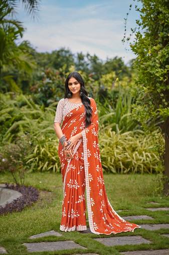 Orange cotton floral print saree with printed blouse piece