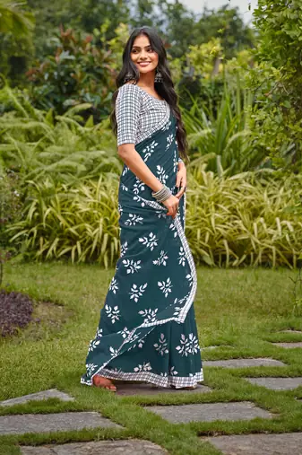 Blue cotton floral print saree with printed blouse piece
