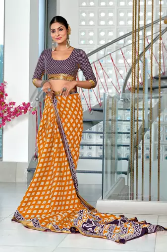 pre draped orange cotton block printed saree with contrast blouse piece