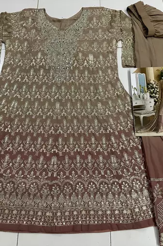 Light pink heavy embroidery dola silk suits